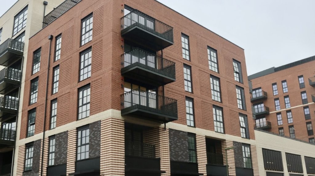 New apartment balconies with metal balustrades